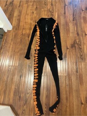 Fashion Nova Black Jumpsuit with Orange Tie-Dye Side Panels